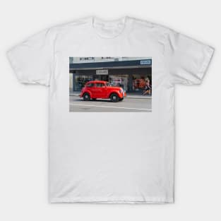 Red Morris 8 car in deco city of Napier New Zealand. T-Shirt